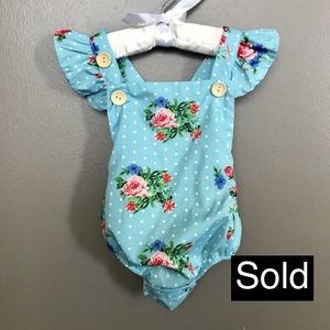 Baby girl romper in blue